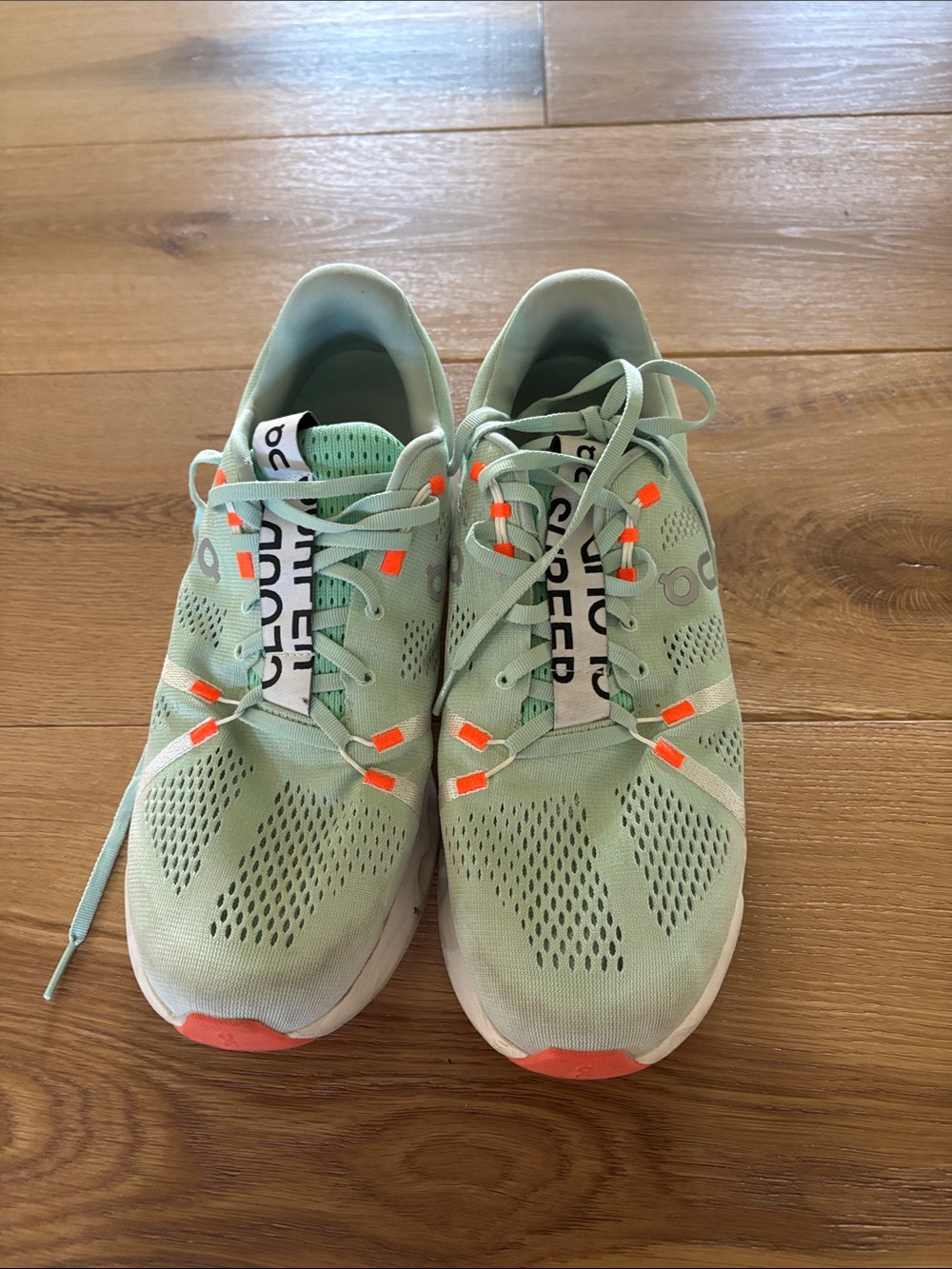 On Running Mint Green Sneakers with Coral Highlights